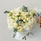 Pure Elegance bouquet with white roses and hydrangeas in premium white wrap
