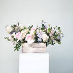 Lavender Bliss bouquet with blush roses and lavender stock in a white wooden box