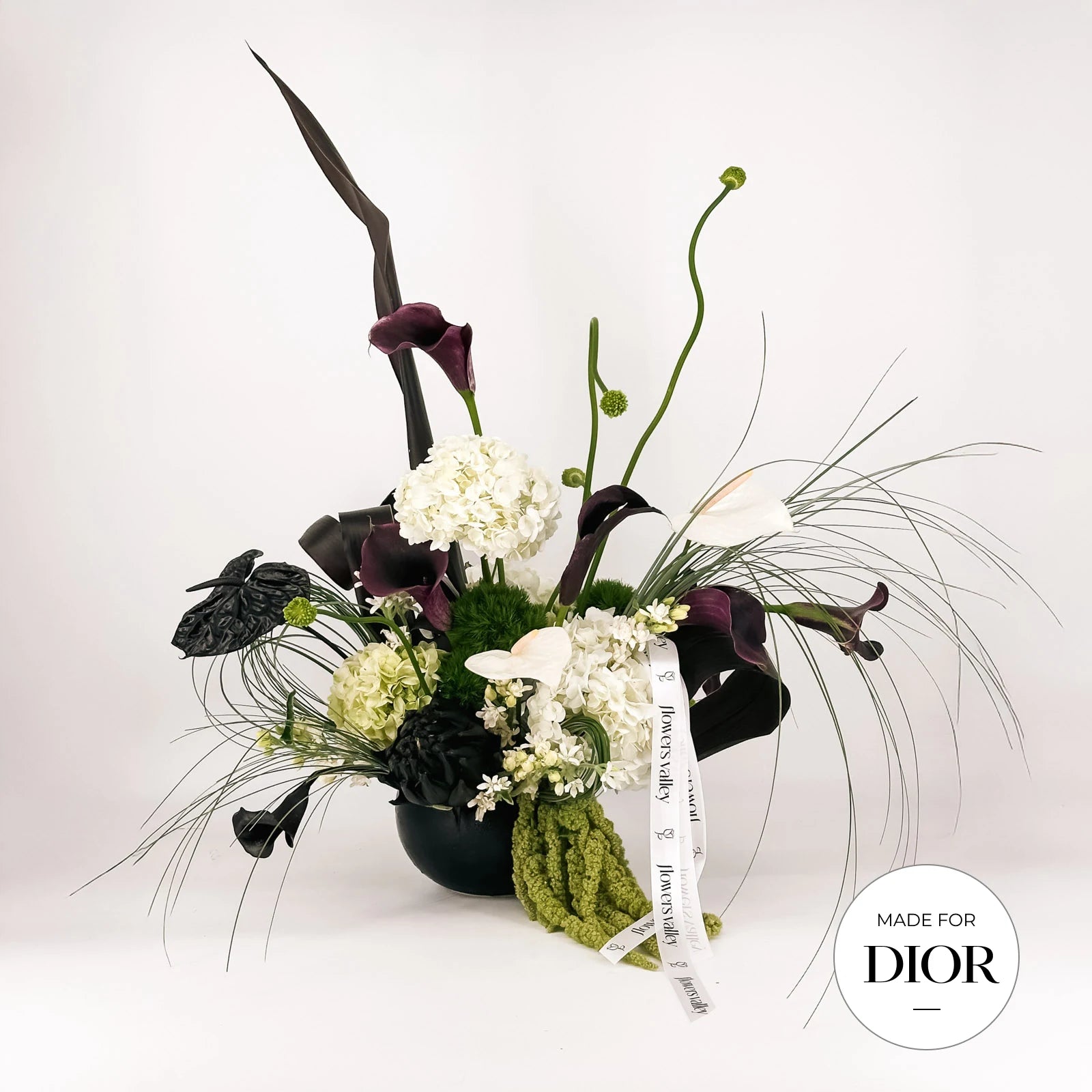 Luxury floral arrangement with black calla lilies, white hydrangeas, and anthuriums – Modern Noir Elegance by Flowers Valley (Made for Dior)
