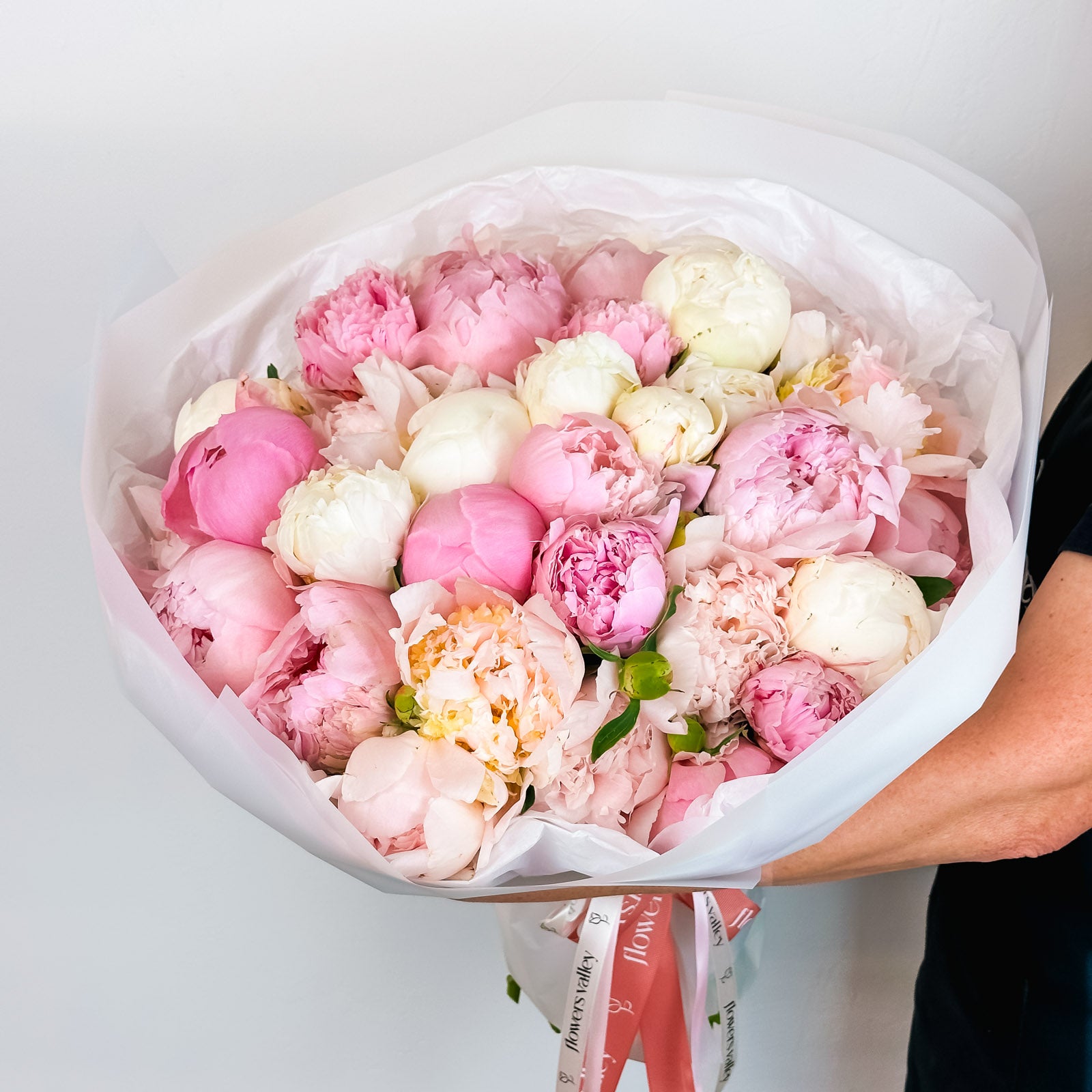 White Blush Peonies flower bouquet, featuring 25 white and 10 pink peonies beautifully wrapped, for premium Bay Area delivery from The Flowers Valley.